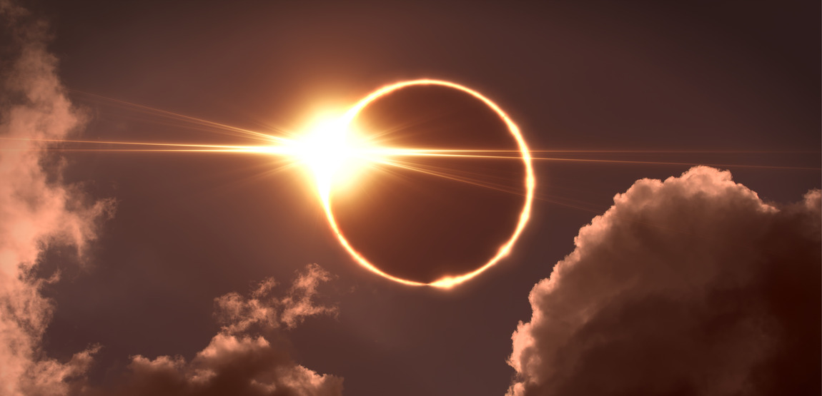 Sun and moon eclipse with a little clouds