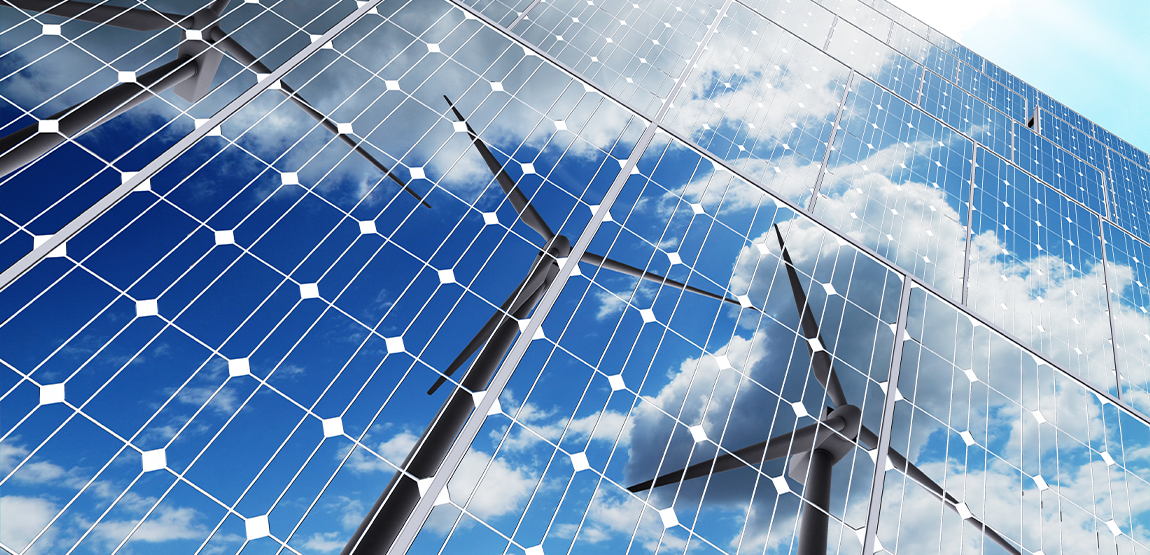 Reflection of wind turbines in solar panels