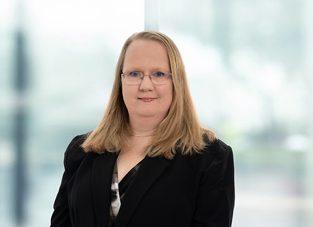 Louise Fry on light blue and white bokeh banner